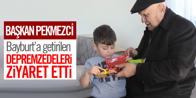 Pekmezci’den depremzedelere ziyaret