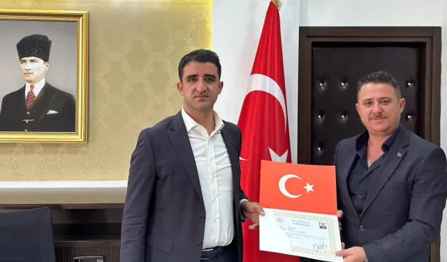 İpsala'dan Keşan’a atanan Müdür Karbuz’a Kaymakam Sevgili'den başarı belgesi